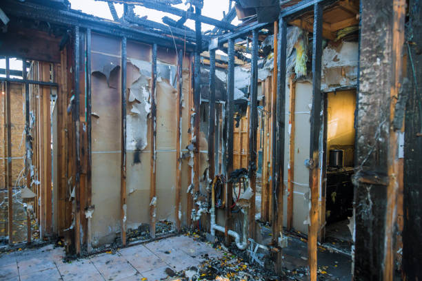 Professional Fire Damage Restoration technician working in Pinehurst, MA